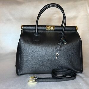 Chic Black Leather Tote with Gold Accents, strap and little lock.